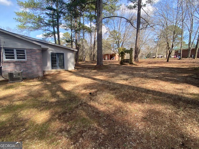 121 Sunset Drive Northeast Calhoun, GA 30701 - Photo 30 of 33 a view of road with large trees