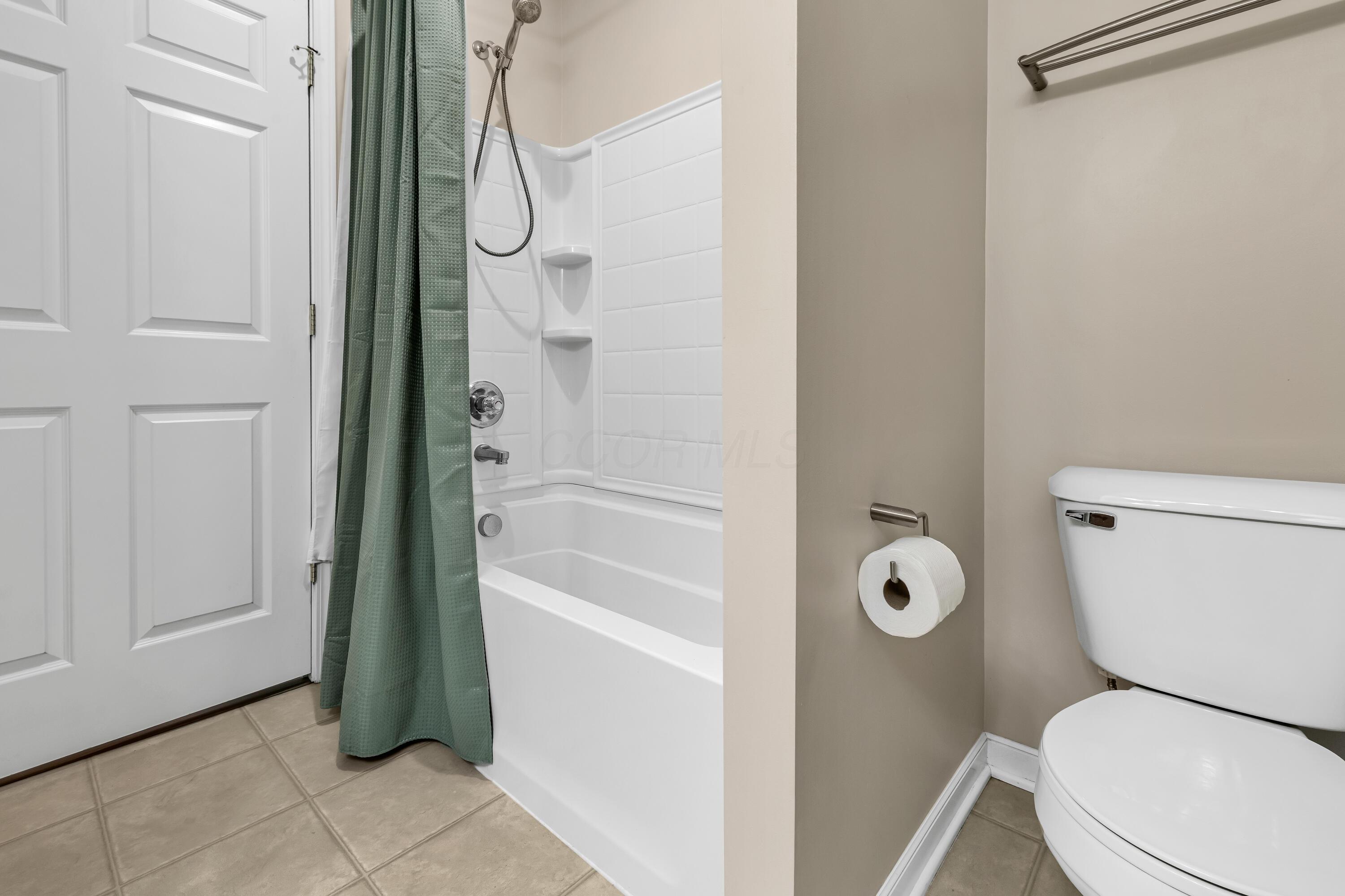 14396 Blamer Road Johnstown, OH 43031 - Photo 30 of 48 • Neutral vinyl flooring
• Tan painted walls
• Linen closet
• 5 bulb wall light
• Enclosed vanity with single
bowl, cultured marble sinktop
• Ceiling exhaust
• Tub/shower combination