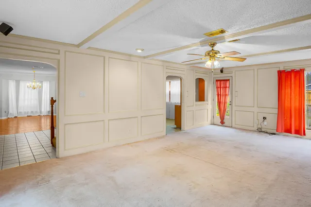 a view of an empty room and window