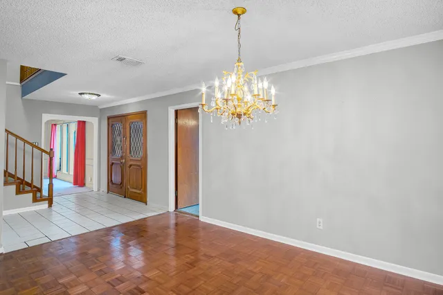 a view of a livingroom with a chandelier