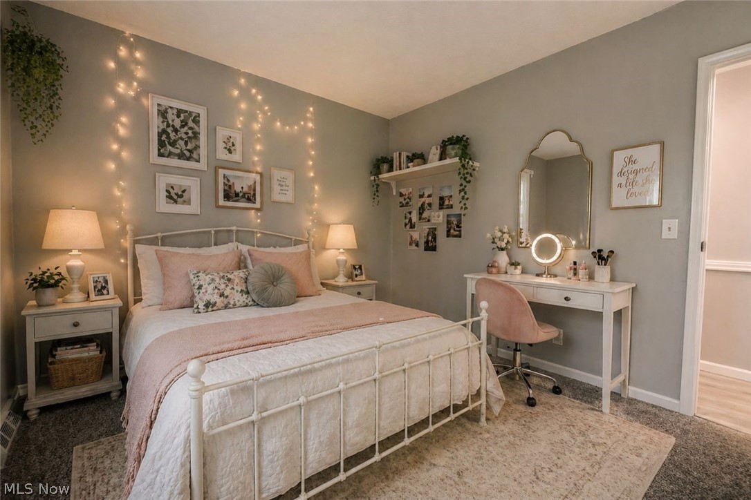 8242 Starburst Road Mentor, OH 44060 - Photo 13 of 37 Bedroom featuring warm gray wall paint and a plush area rug