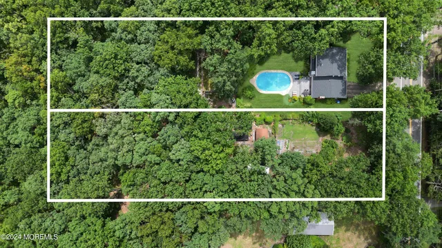 a view of a yard and deck