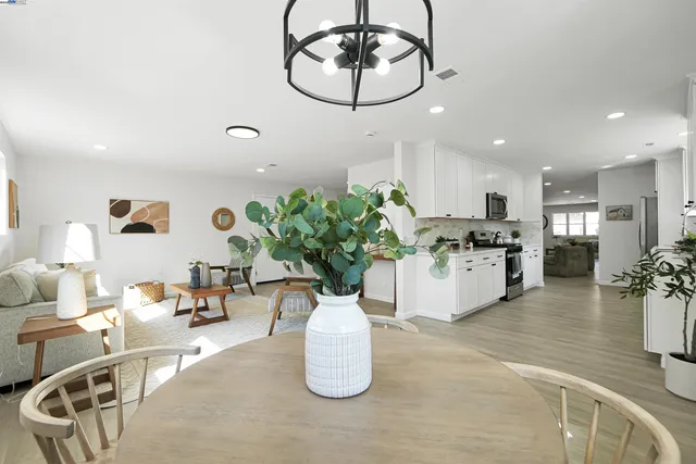 a living room with furniture and a table