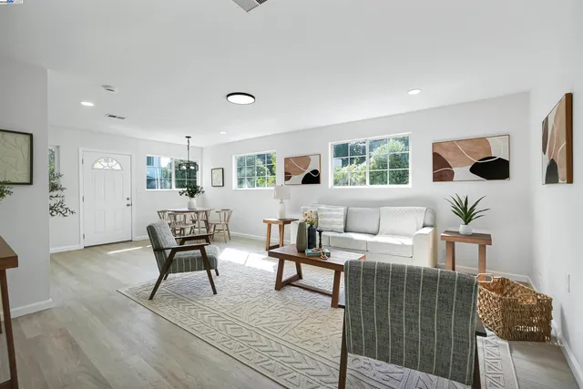 a bathroom with a toilet sink and shower