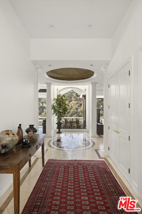 10557 Rocca Place Los Angeles, CA 90077 - Photo 6 of 19 a very nice looking room with a large window