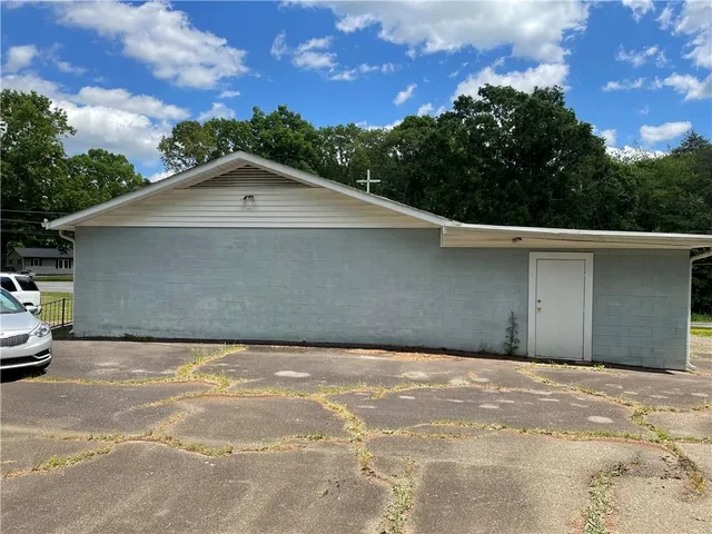 a house view with a backyard space