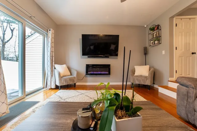 a bed room with a bed and a chandelier