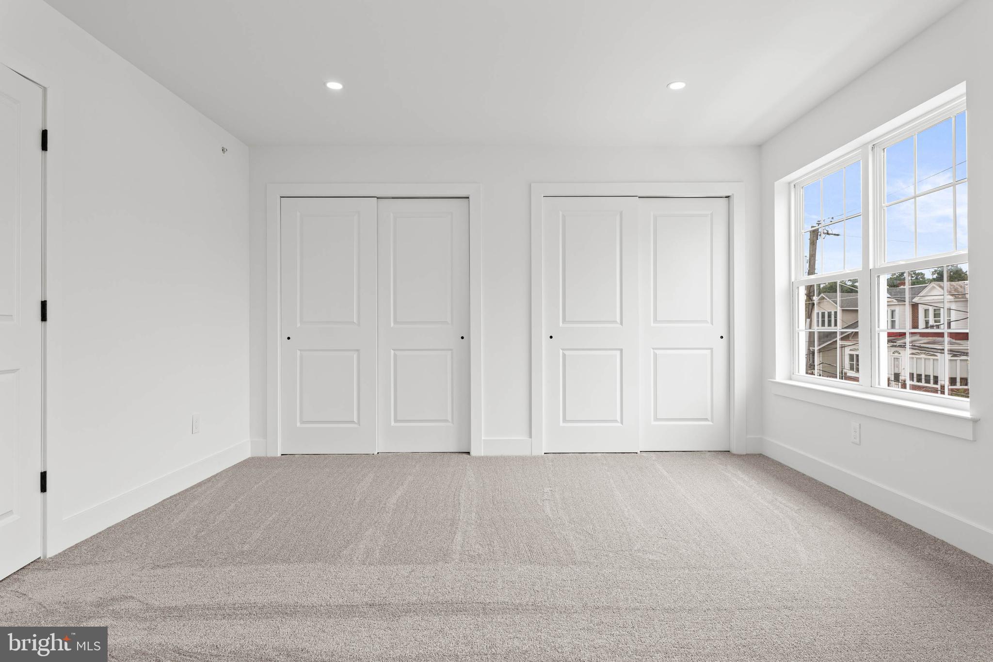 211 8th Street Bridgeport, PA 19405 - Photo 10 of 17 a view of an empty room with a window