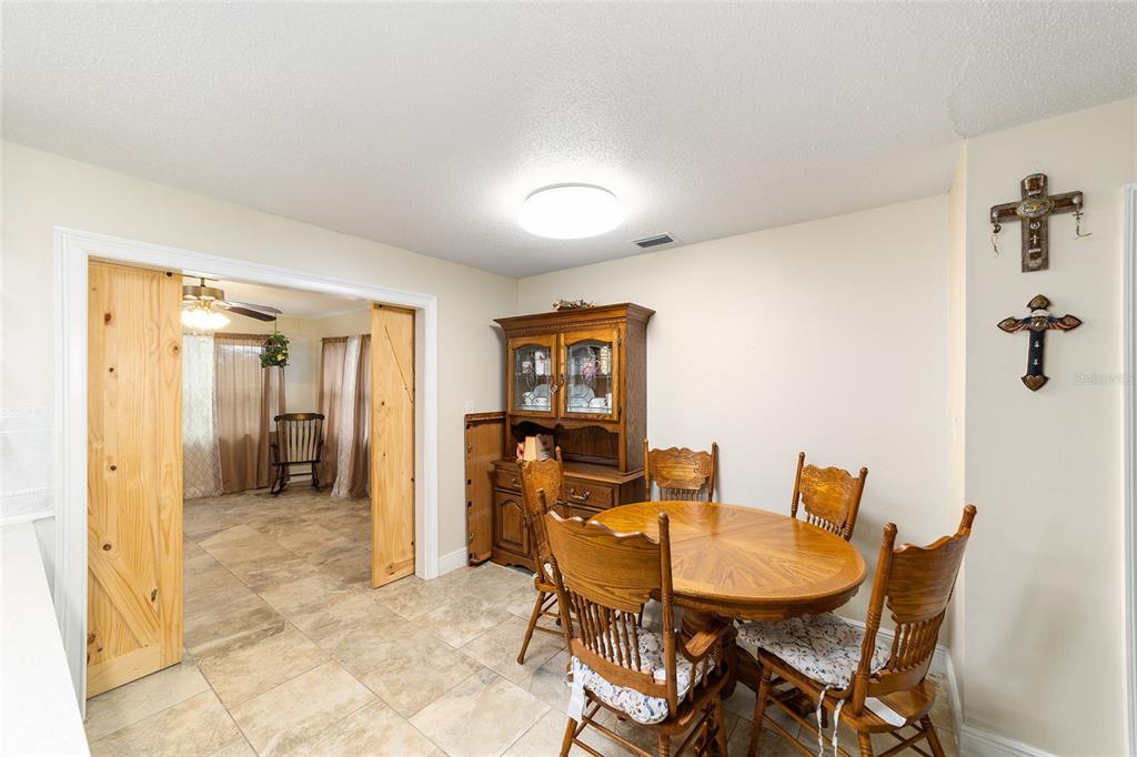 11 Brook Place Ocala, FL 34472 - Photo 14 of 27 a view of a dining room with furniture