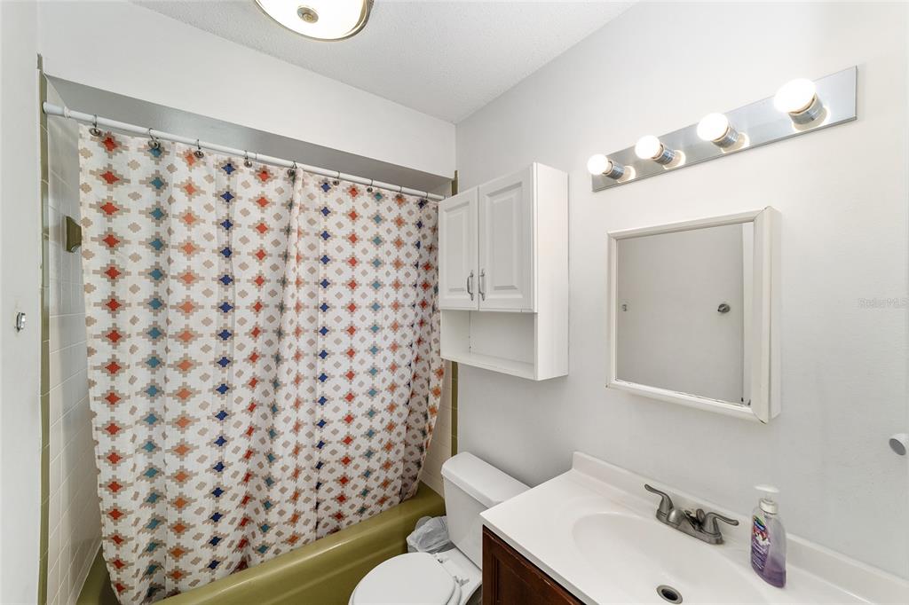 11 Brook Place Ocala, FL 34472 - Photo 22 of 27 a bathroom with a sink toilet and shower