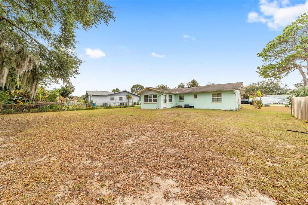 11 Brook Place Ocala, FL 34472 - Photo 25 of 27 a view of a house with yard and lake view