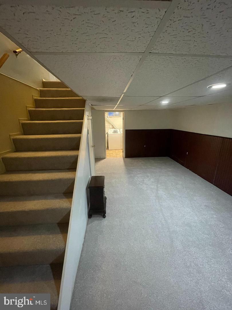 3654 Clarenell Road Baltimore, MD 21229 - Photo 13 of 15 a view of an empty room with stairs