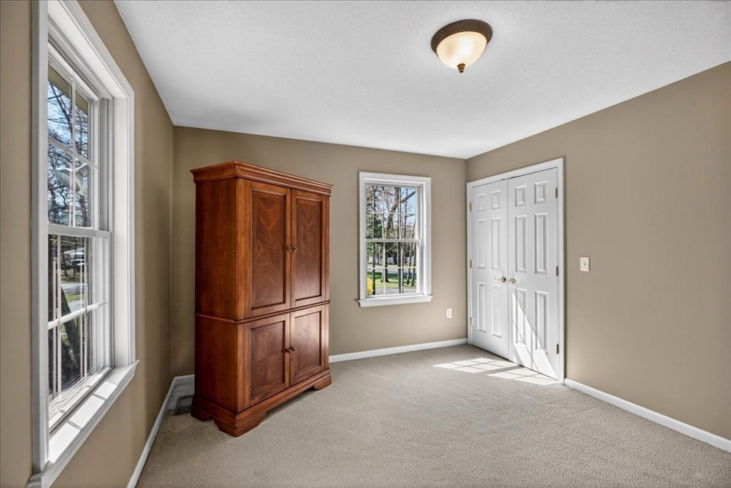 1318 Piper Road West Springfield, MA 01089 - Photo 31 of 42 a view of empty room with windows and refrigerator