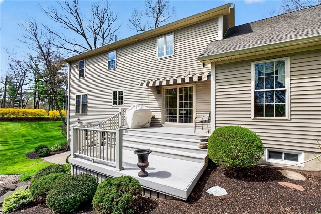 1318 Piper Road West Springfield, MA 01089 - Photo 38 of 42 a view of a house with backyard and a garden