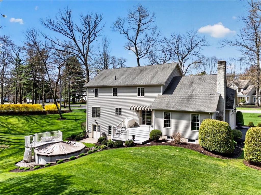 1318 Piper Road West Springfield, MA 01089 - Photo 5 of 42 a front view of a house with a garden and trees