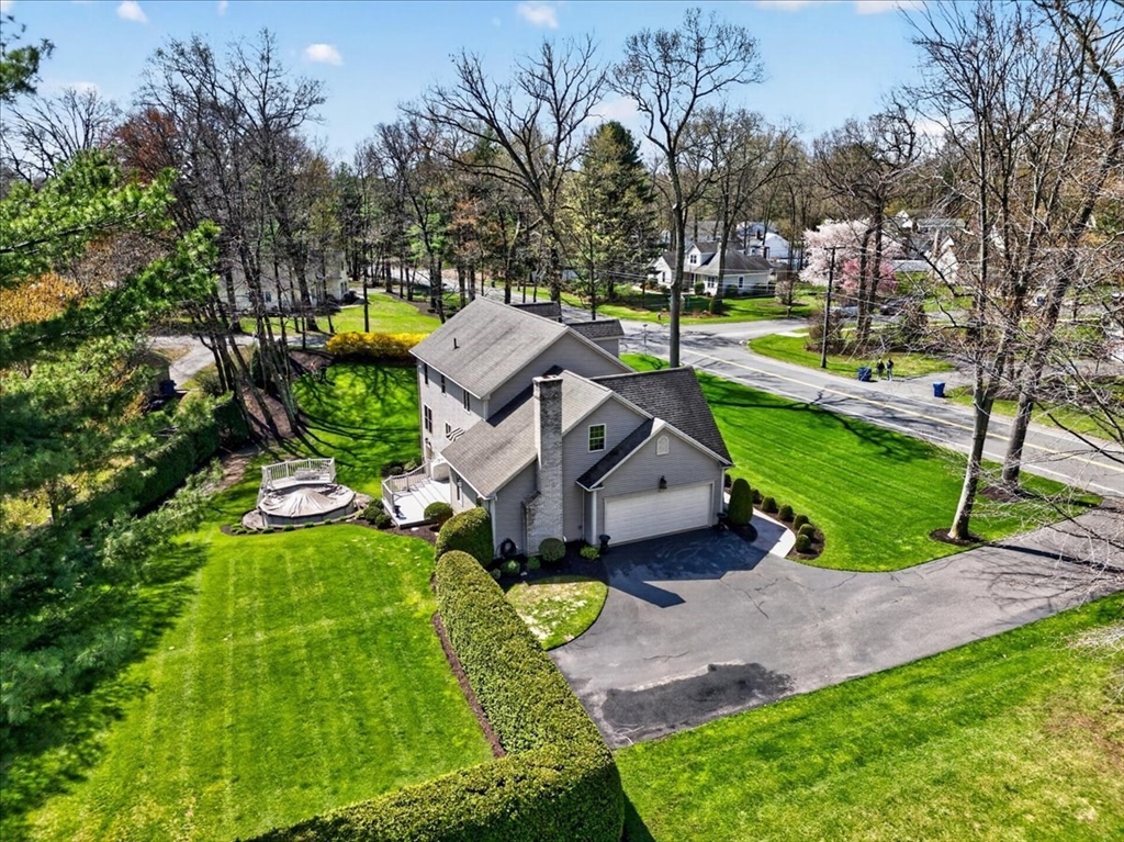 1318 Piper Road West Springfield, MA 01089 - Photo 8 of 42 an aerial view of a house with garden space and trees all around