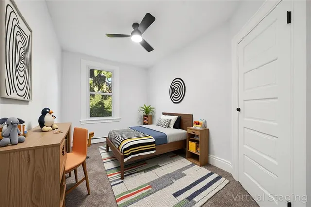 a bedroom with furniture and a window