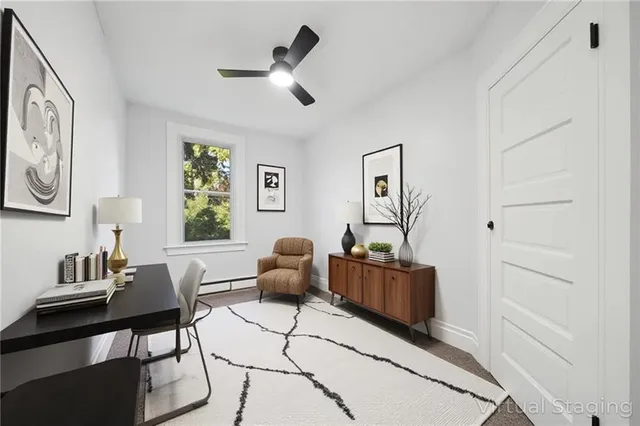a living room with furniture and window