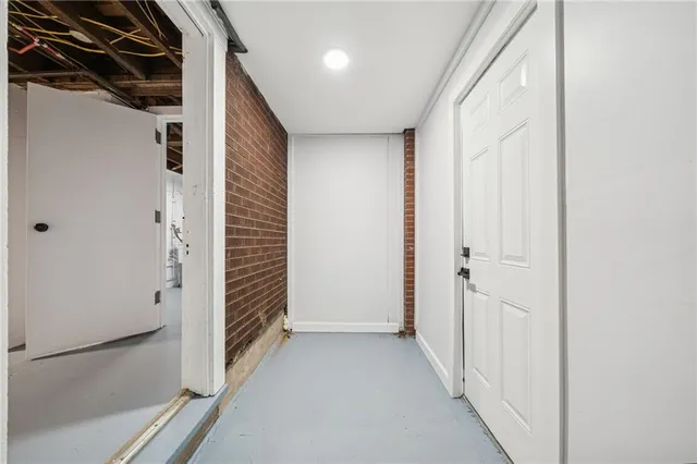a view of a patio with couches table and chairs and potted plants