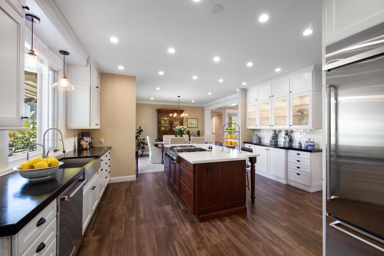 1975 Inverness Lane Montecito, CA 93108 - Photo 8 of 22 a kitchen with a sink appliances wooden floor and a counter top space