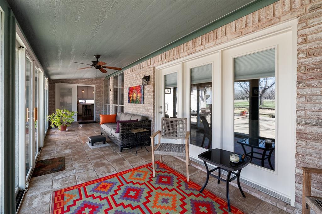 8903 Ravenswood Road Granbury, TX 76049 - Photo 15 of 36 The Three Season Room Is One Of The Owner's Favorite Spaces