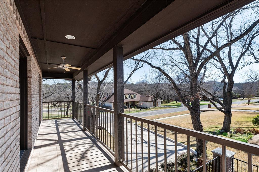 8903 Ravenswood Road Granbury, TX 76049 - Photo 31 of 36 Covered Balcony With Beautiful Views
