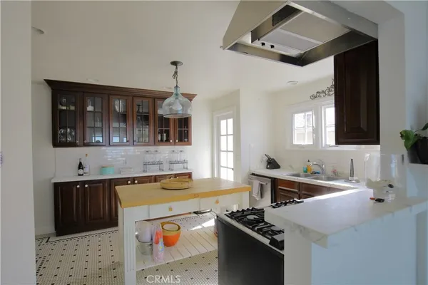 a spacious bedroom with a bed and a fireplace