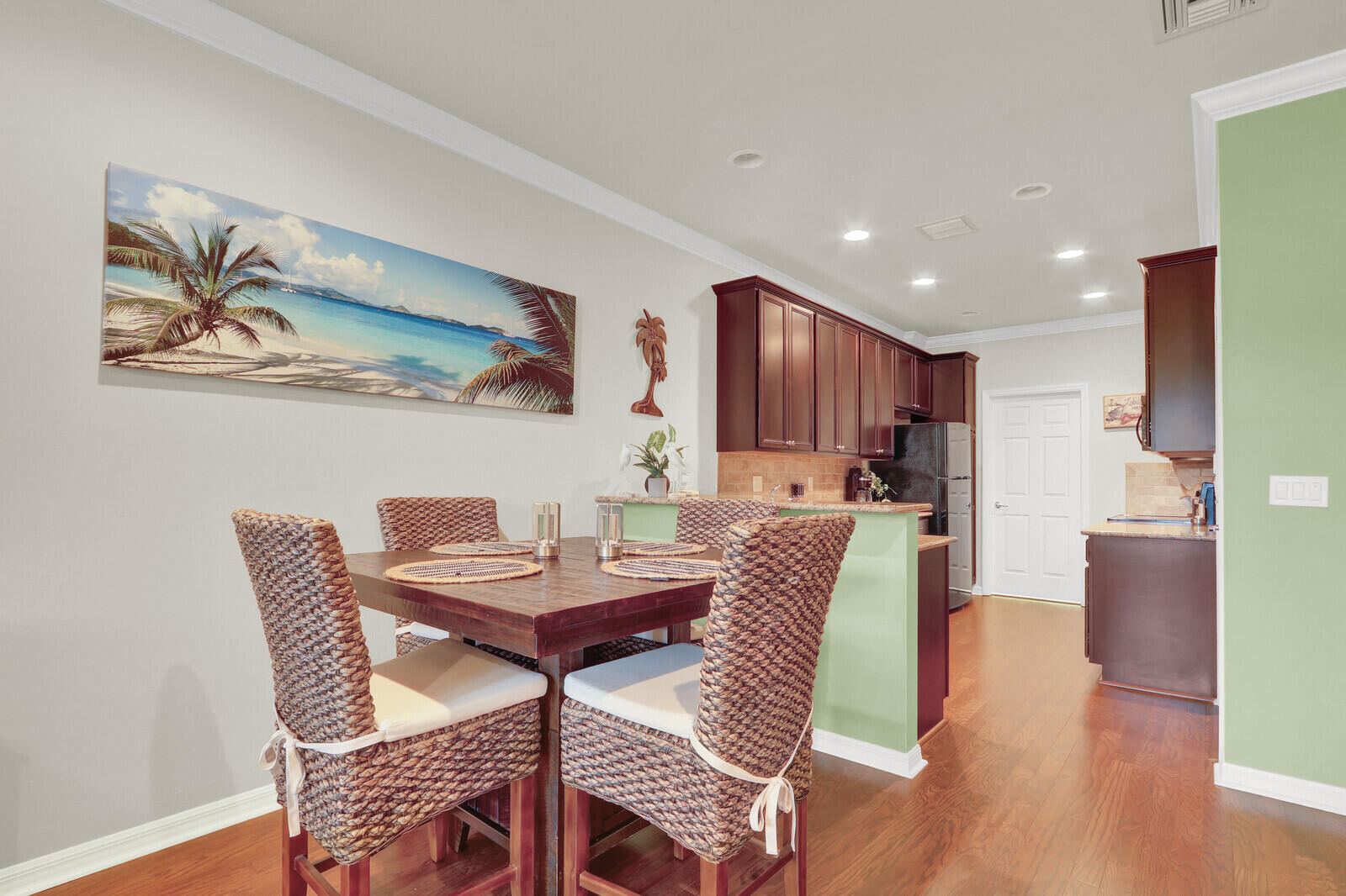 3277 East Mallory Boulevard Jupiter, FL 33458 - Photo 12 of 44 a view of a dining room with furniture