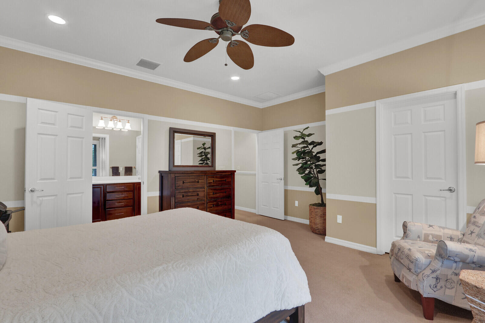 3277 East Mallory Boulevard Jupiter, FL 33458 - Photo 20 of 44 a bed room with a bed and a television