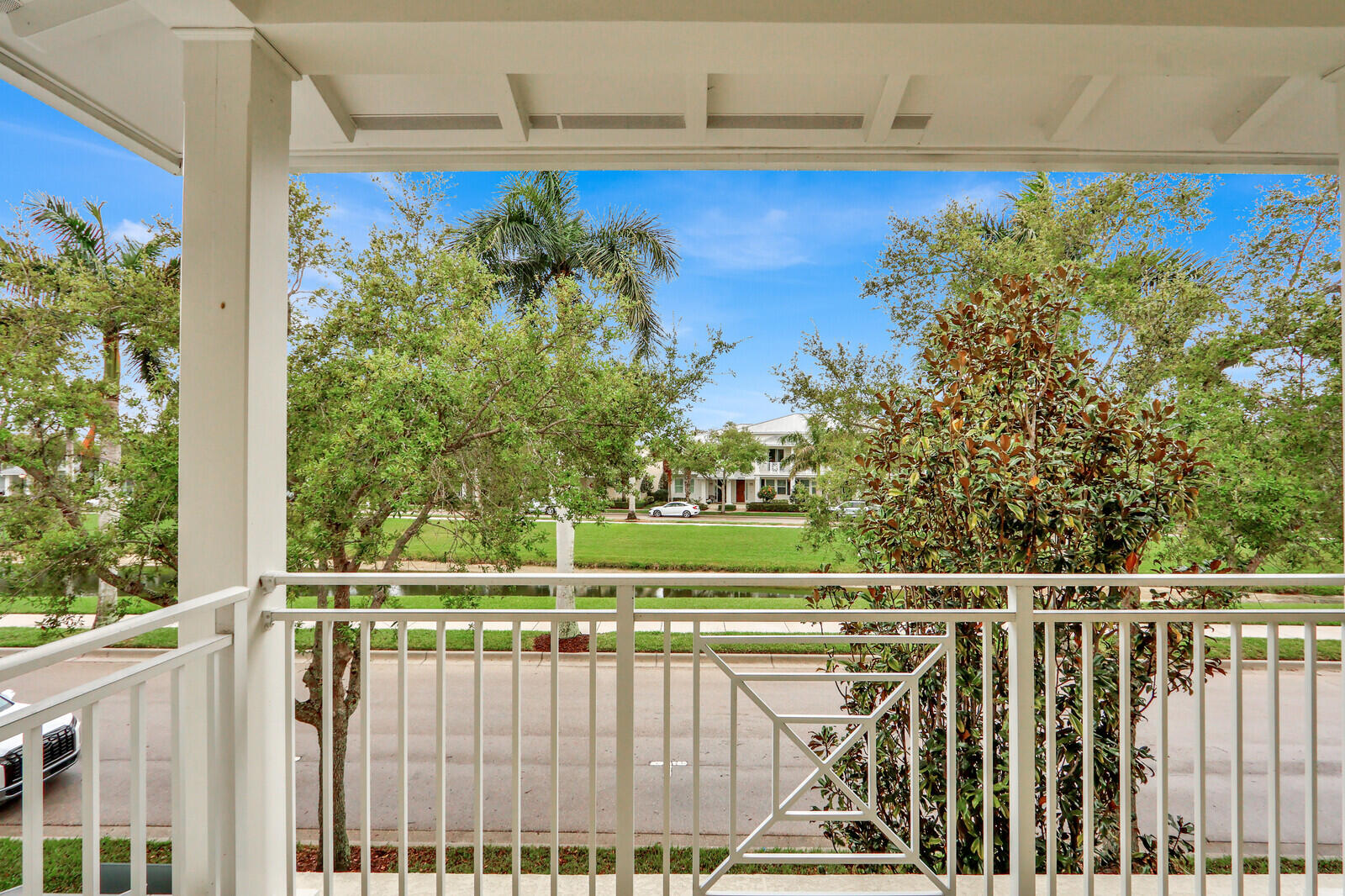 3277 East Mallory Boulevard Jupiter, FL 33458 - Photo 22 of 44 a view of a balcony with wooden floor and outdoor space