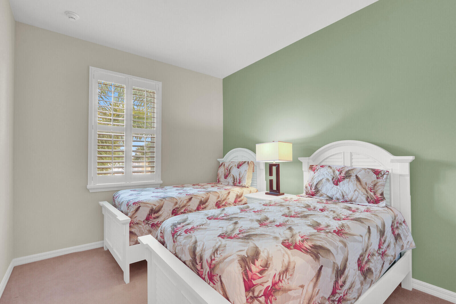 3277 East Mallory Boulevard Jupiter, FL 33458 - Photo 25 of 44 a bedroom with a bed and a window