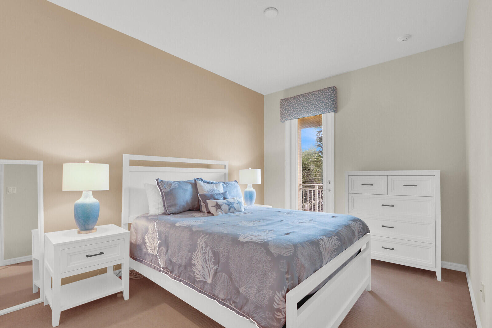 3277 East Mallory Boulevard Jupiter, FL 33458 - Photo 28 of 44 a bedroom with a bed and a window
