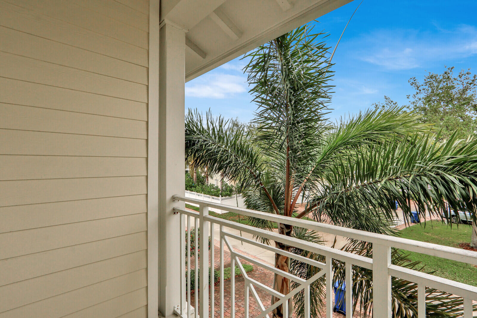 3277 East Mallory Boulevard Jupiter, FL 33458 - Photo 30 of 44 a view of a balcony with plants
