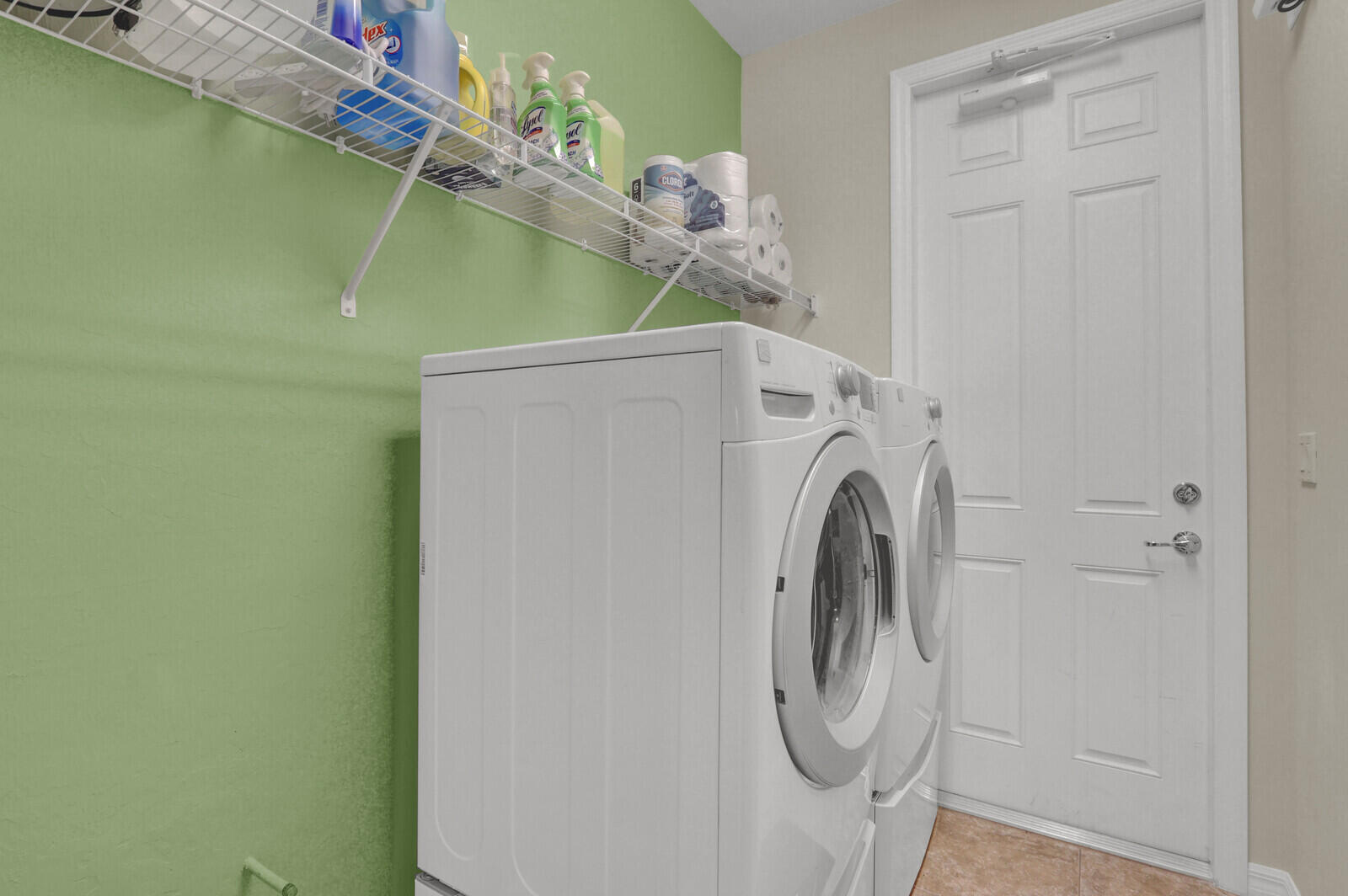 3277 East Mallory Boulevard Jupiter, FL 33458 - Photo 31 of 44 a utility room with dryer and washer