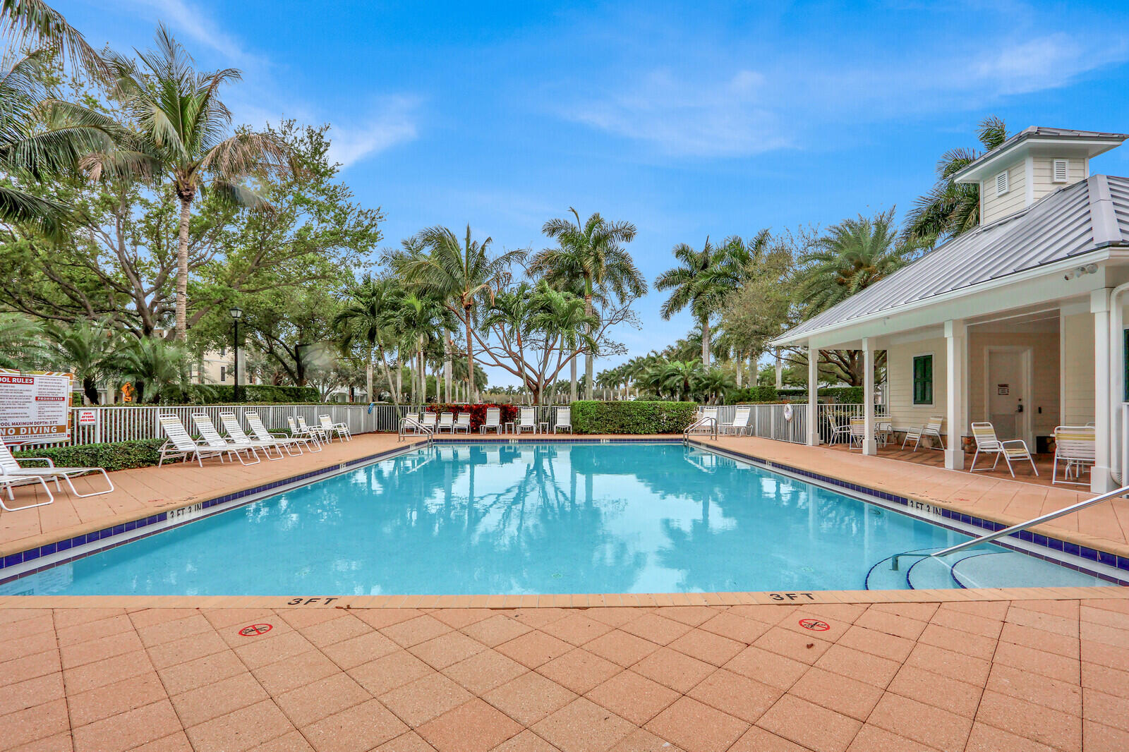 3277 East Mallory Boulevard Jupiter, FL 33458 - Photo 35 of 44 a view of swimming pool with lounge chair