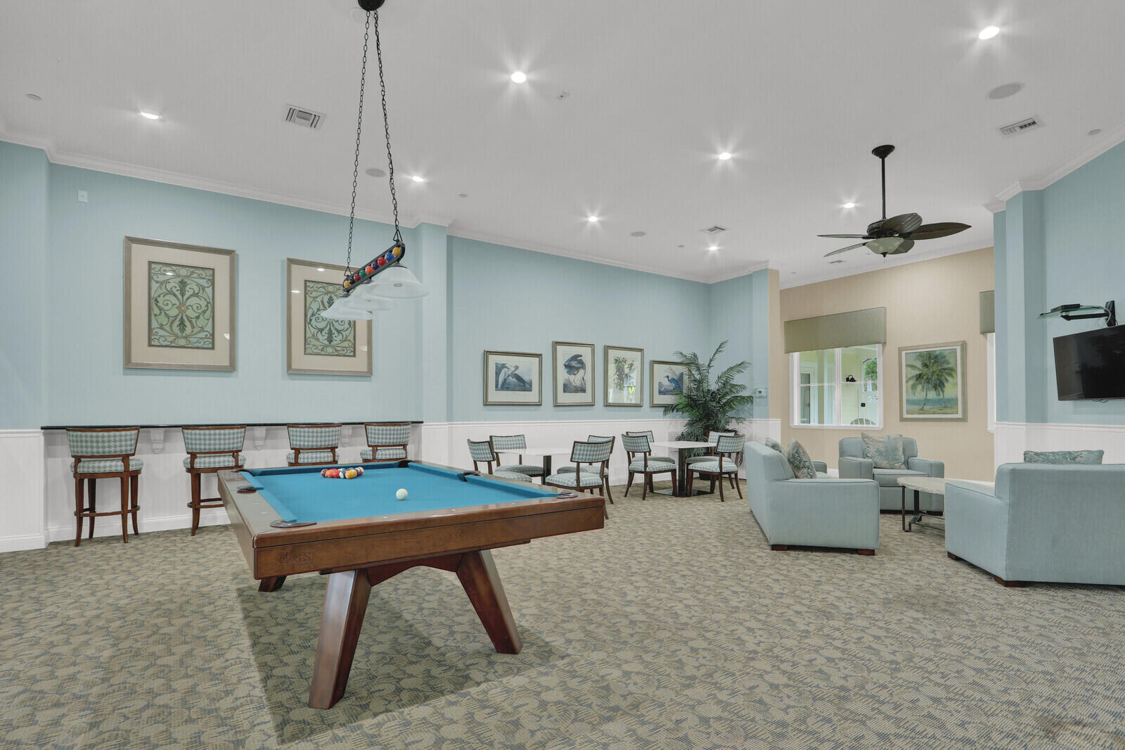 3277 East Mallory Boulevard Jupiter, FL 33458 - Photo 39 of 44 a living room with furniture and a table