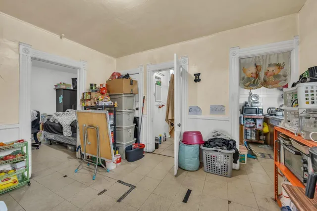 a view of a dining room with furniture and a table chair