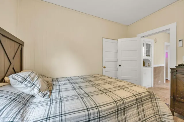 a view of cars parked in front of a house