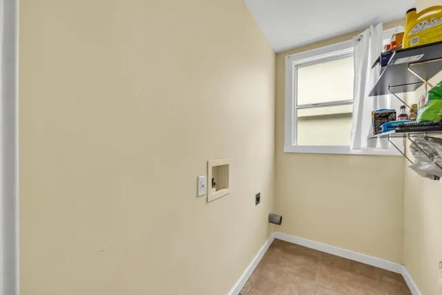 a kitchen with a refrigerator a sink and dishwasher