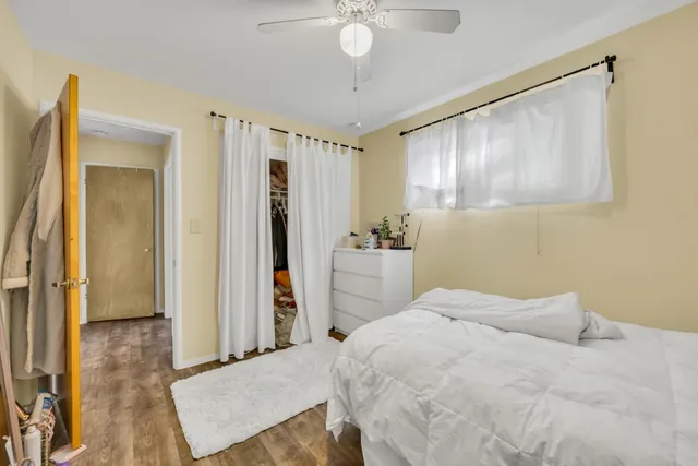 an aerial view of a house with outdoor space and street view