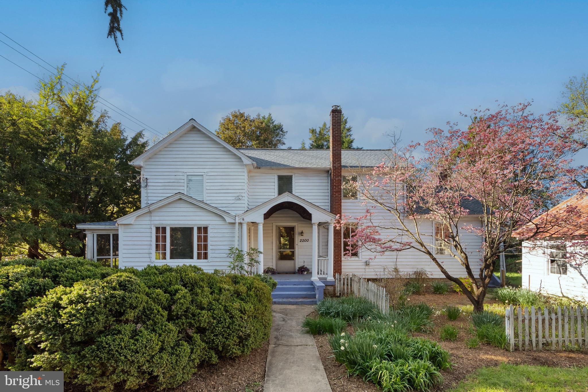 2200 Enterprise Road Bowie, MD 20721 - Photo 1 of 29 a front view of a house with garden