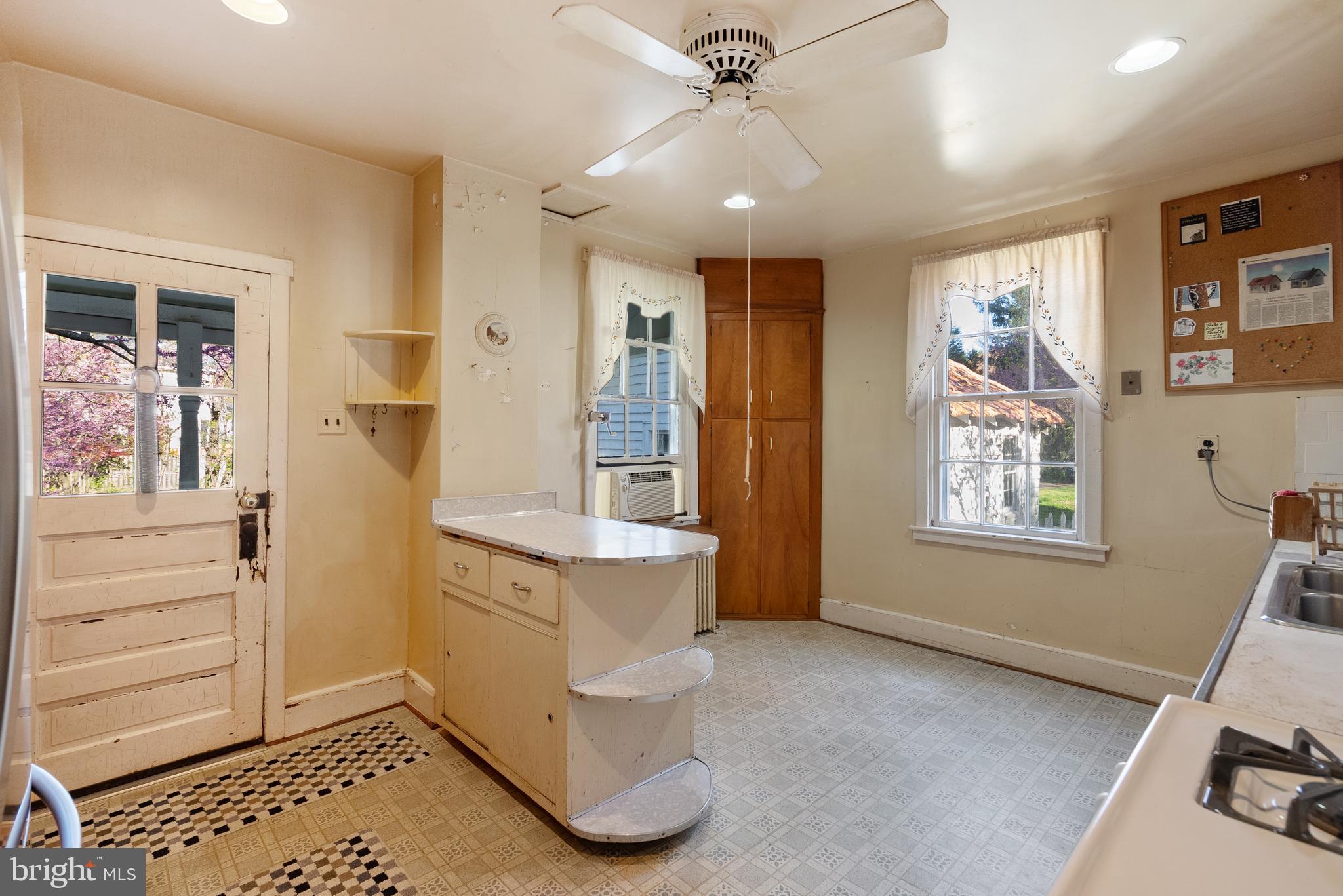 2200 Enterprise Road Bowie, MD 20721 - Photo 14 of 29 a spacious bathroom with a double vanity sink a mirror and a bathtub