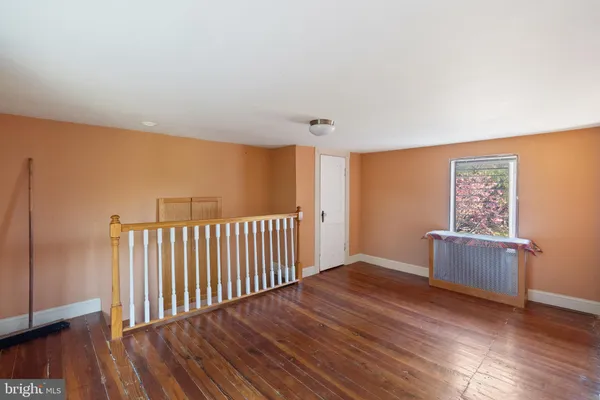 a view of livingroom with furniture and wooden floor