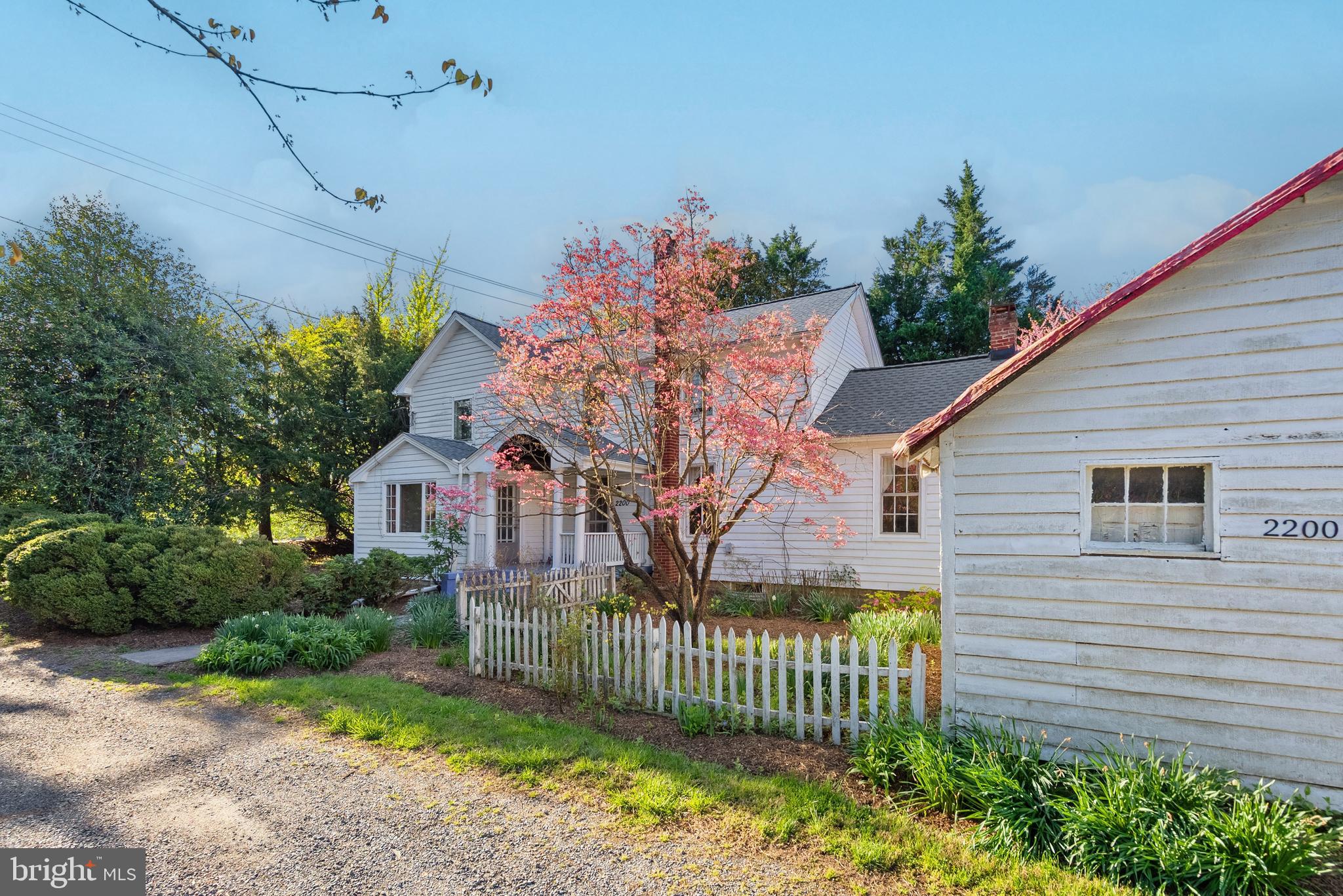 2200 Enterprise Road Bowie, MD 20721 - Photo 2 of 29 a front view of a house with garden