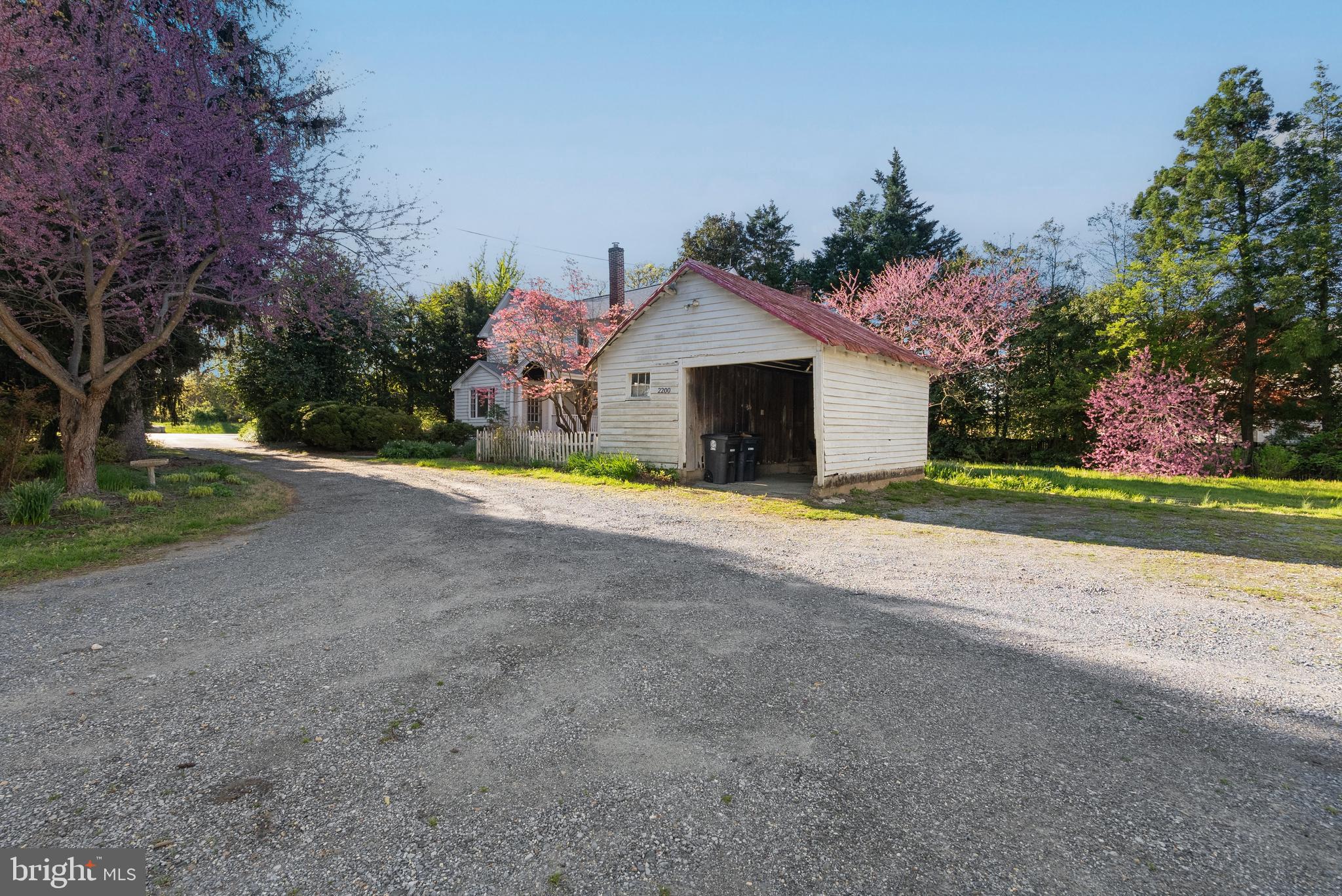 2200 Enterprise Road Bowie, MD 20721 - Photo 26 of 29 a front view of a house with a yard and garage