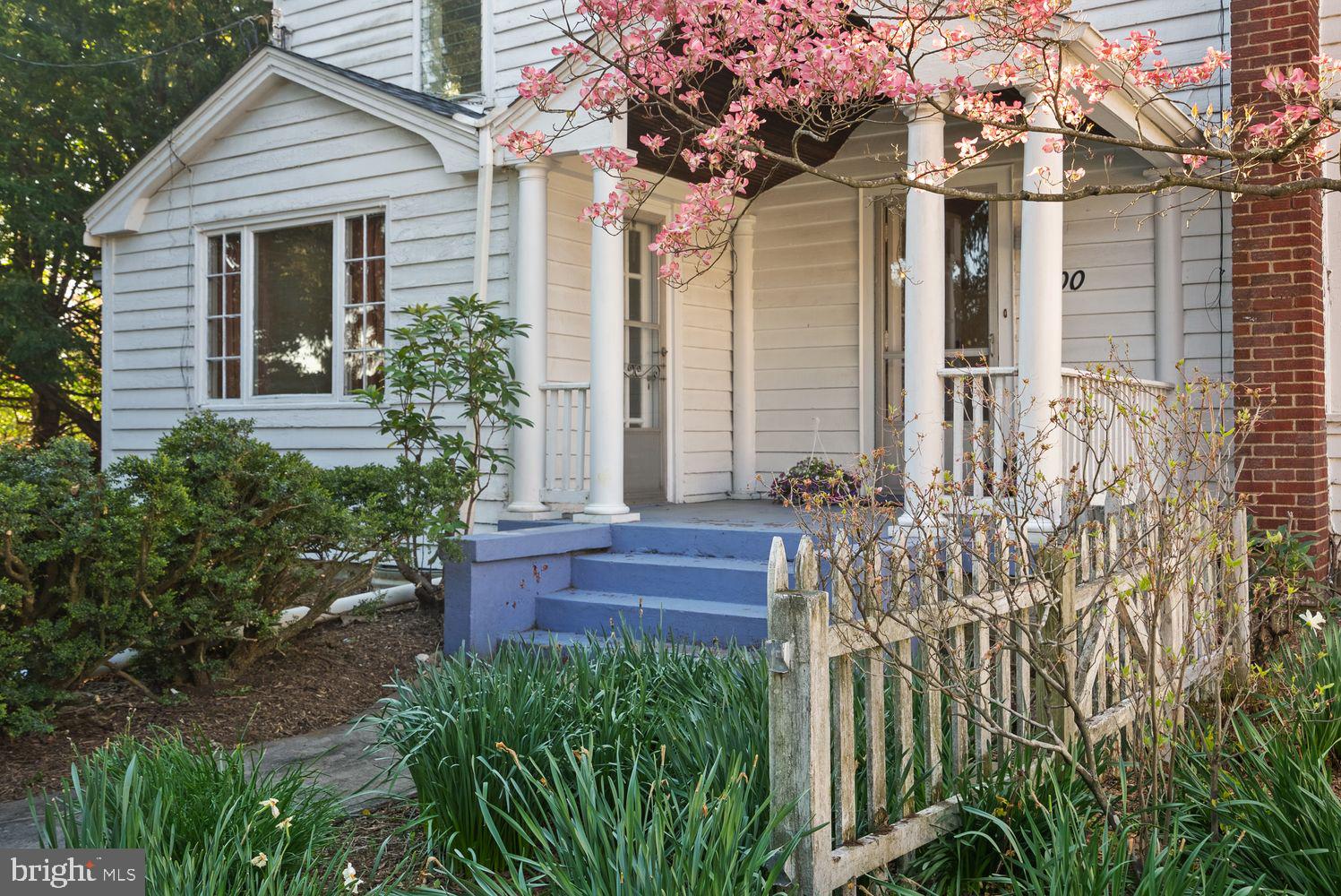 2200 Enterprise Road Bowie, MD 20721 - Photo 3 of 29 a front view of a house with a garden