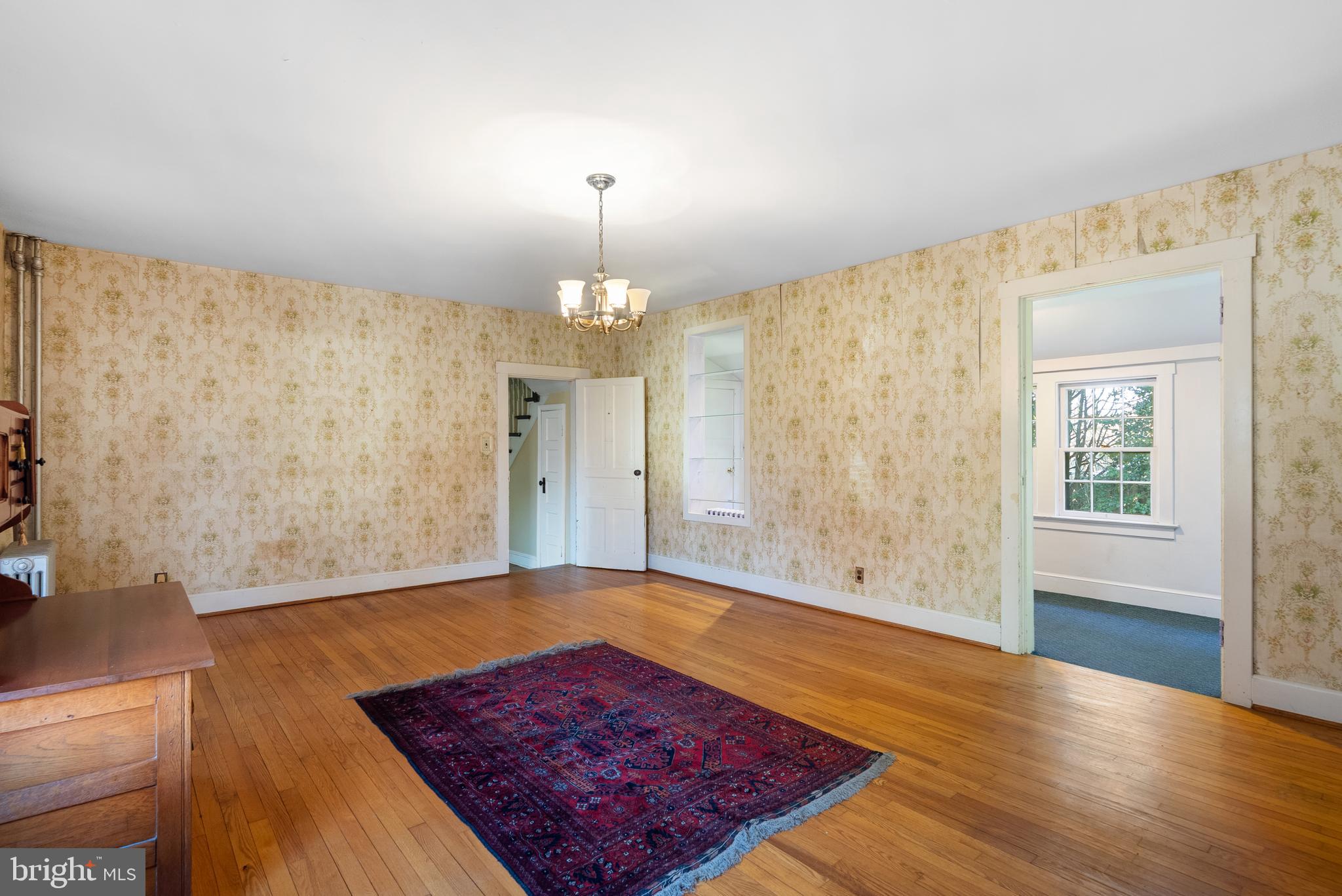 2200 Enterprise Road Bowie, MD 20721 - Photo 9 of 29 wooden floor in an empty room with a window