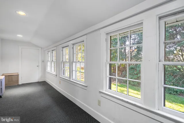 a view of room with window and floor to ceiling window