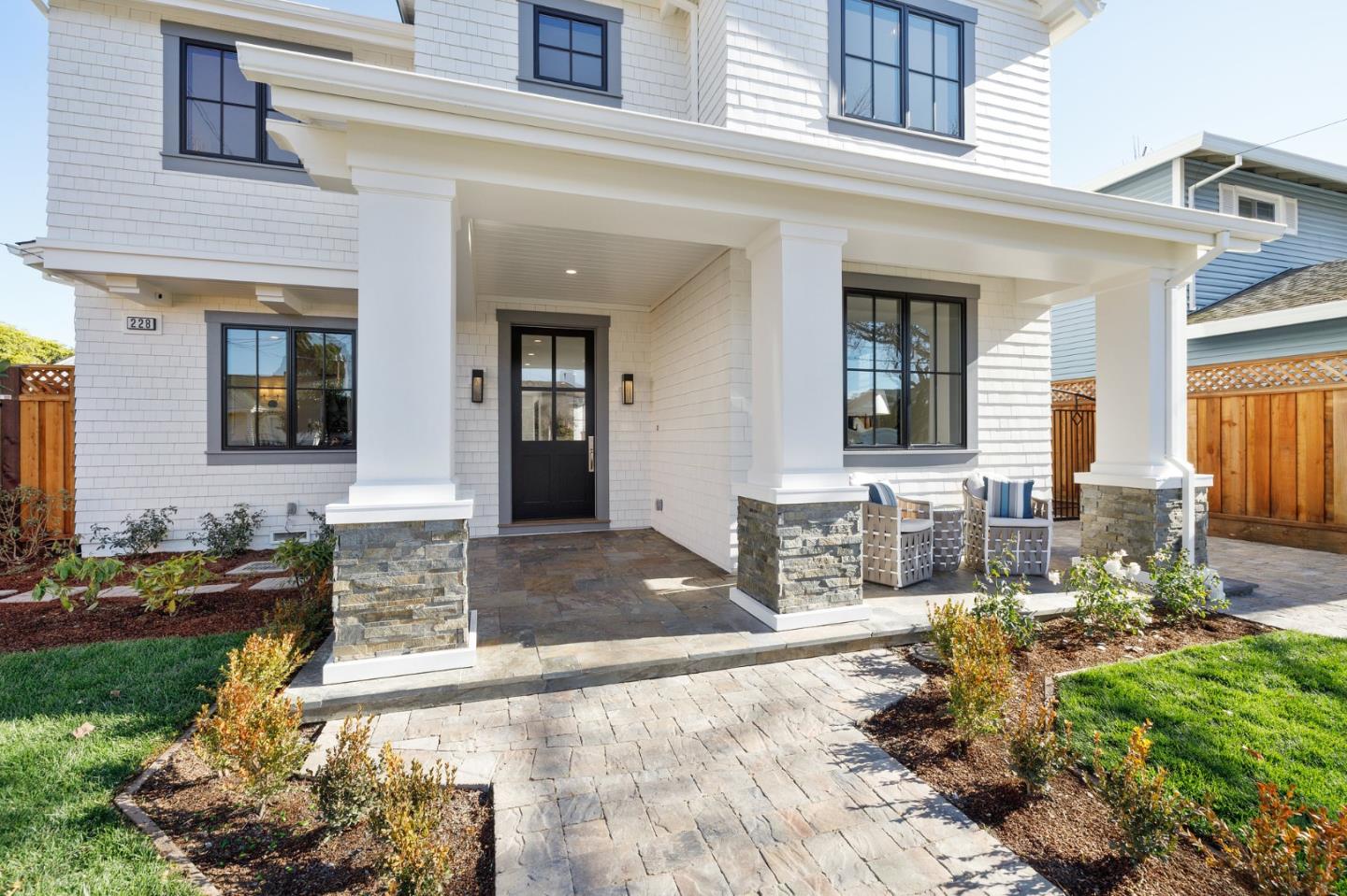 228 Stanley Road Burlingame, CA 94010 - Photo 13 of 100 a front view of a house with outdoor seating
