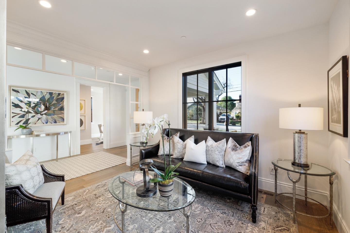 228 Stanley Road Burlingame, CA 94010 - Photo 21 of 100 a living room with furniture and a large window
